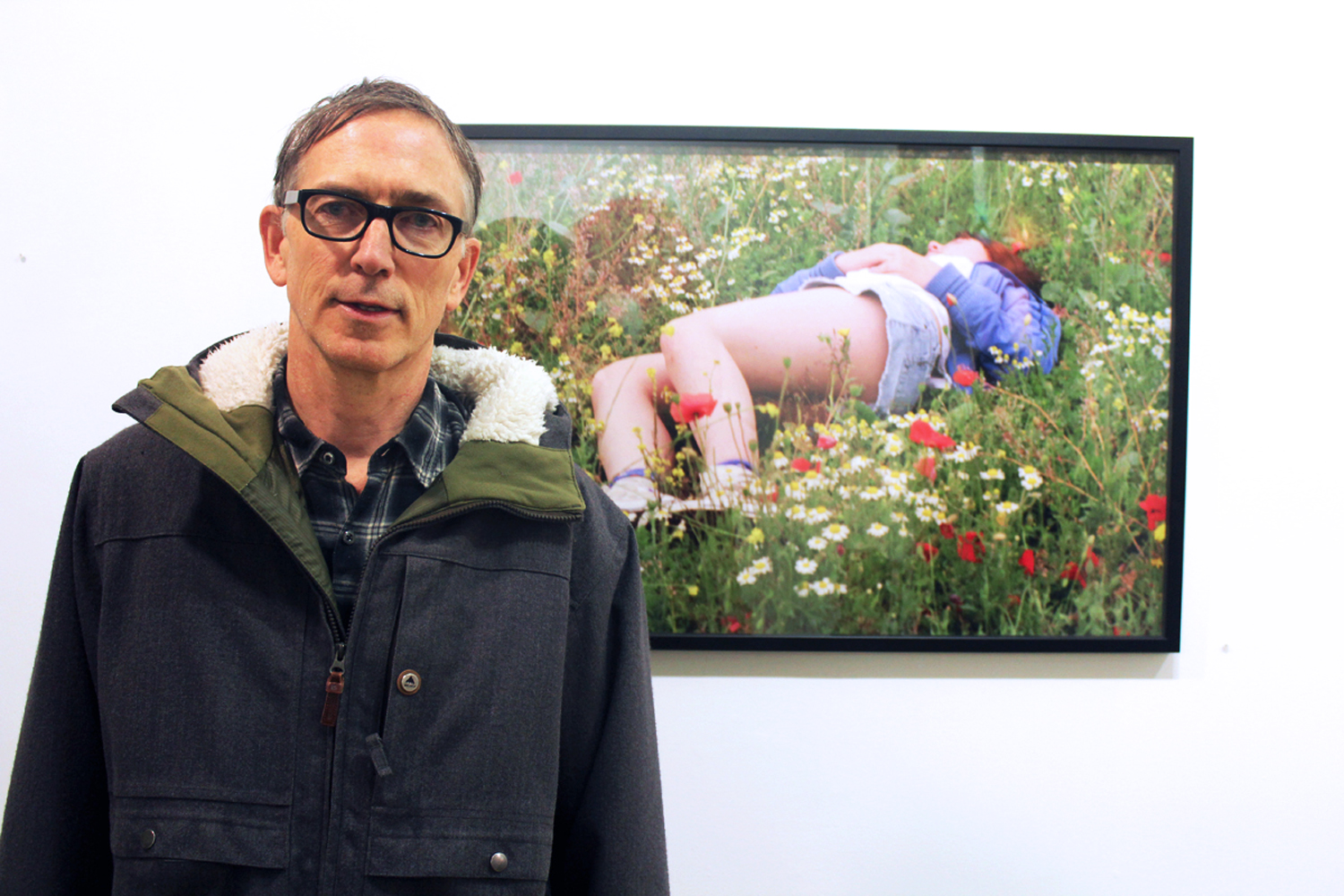 Richard Kern with one of his photos at Bullet Space Gallery, New
