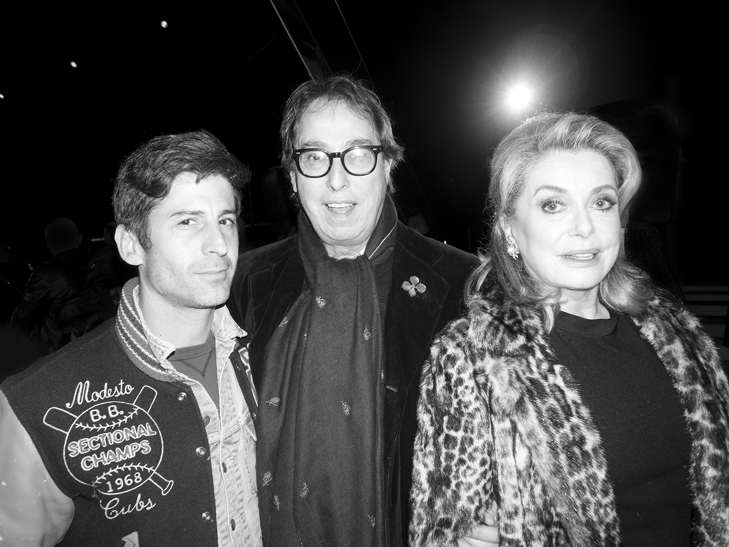 André Saraiva, Gilles Dufour, and Catherine Deneuve after the Saint Laurent F/W 2014... purple
